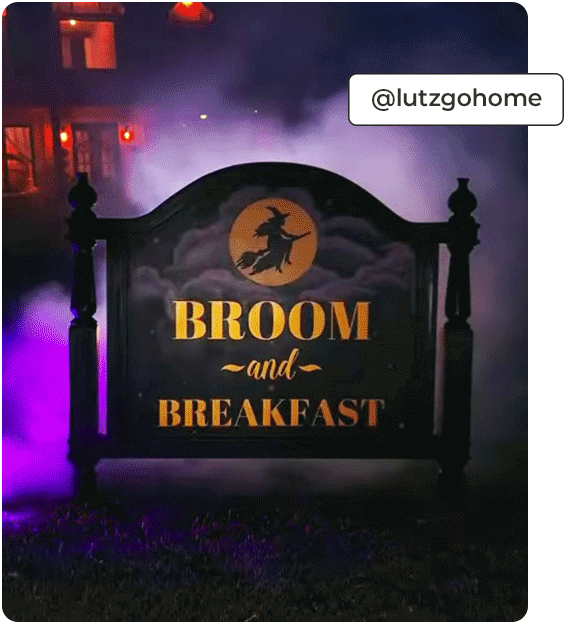 Handpainted sign of a witch, on broomstick, overlaying a moon within clouds and a night sky for Broom and Breakfast. Courtesy of @lutzhome.