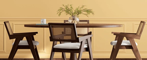 40% off* Paints and Stains. Plus 30% Off* Paint Supplies. Dark wood round table with 4 mid-century modern chairs in room painted in White Raisin.