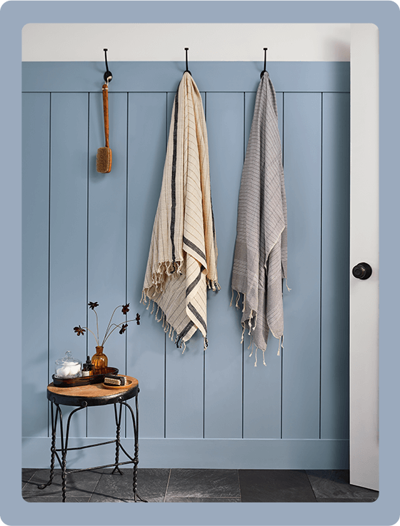 Mudroom with beadboard and trim painted in Aleutian.