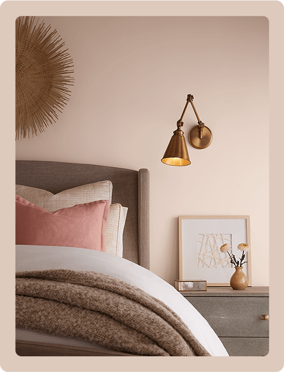 Malted Milk painted bedroom wall with contemporary gray wood bed and end table