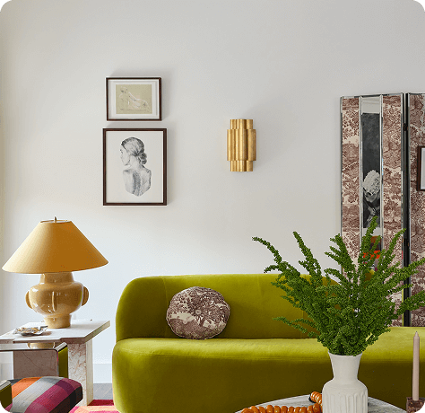 Lime green modern sofa with home decor in White Snow painted living room.