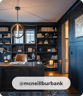 Inkwell painted walls and built-in bookshelves in cozy, earthy home office. @mcneillburbank.