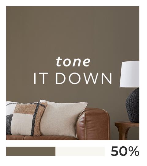 Close-up of living room painted in neutral brown.