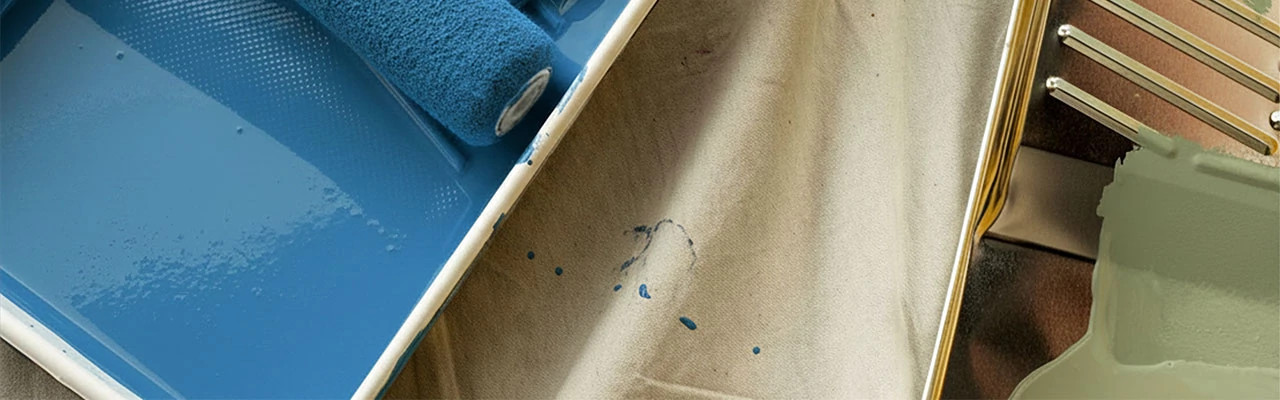 A painting tray with blue paint.