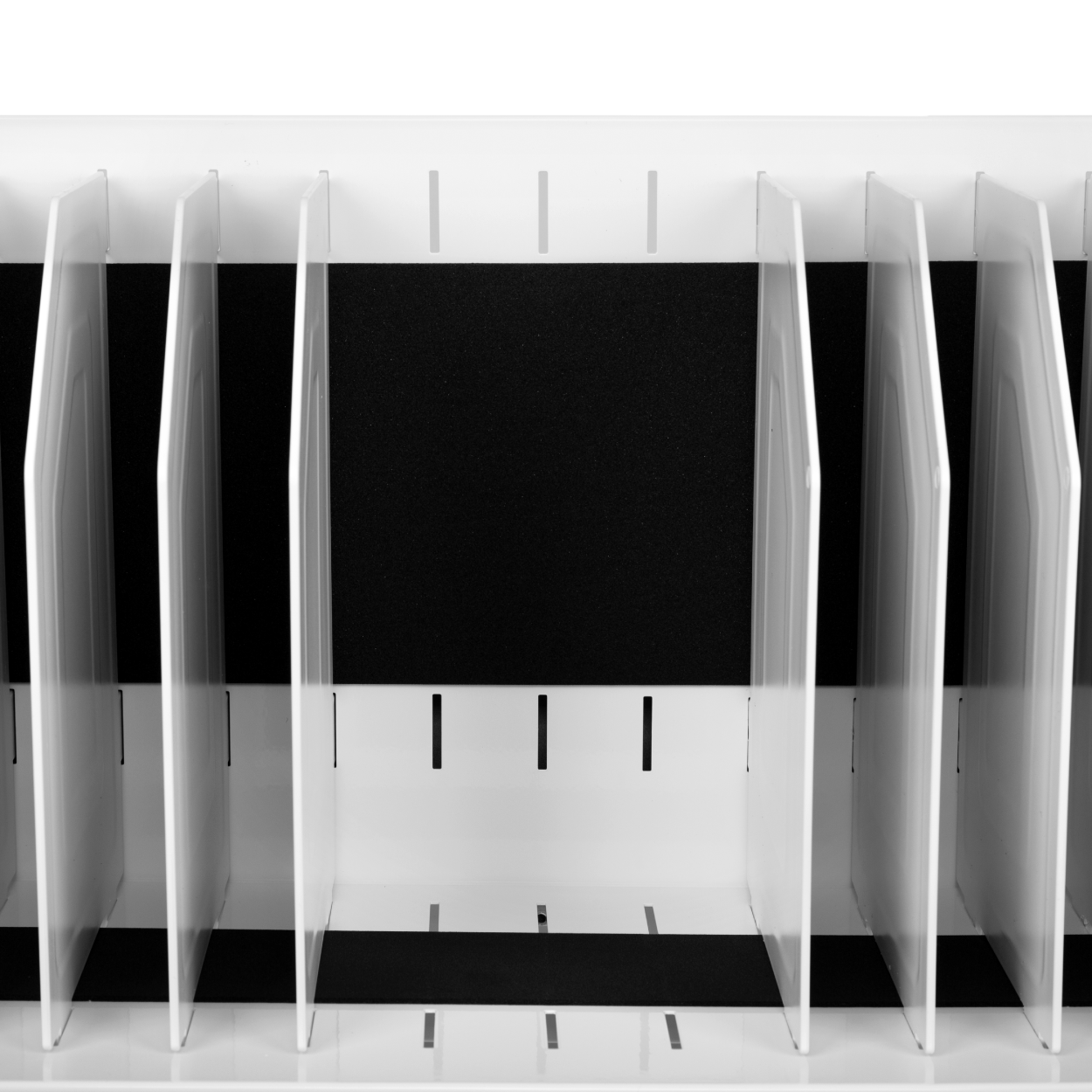 Interior view of charging cart with sloped padded shelves and removable dividers for customizable, secure device storage.
