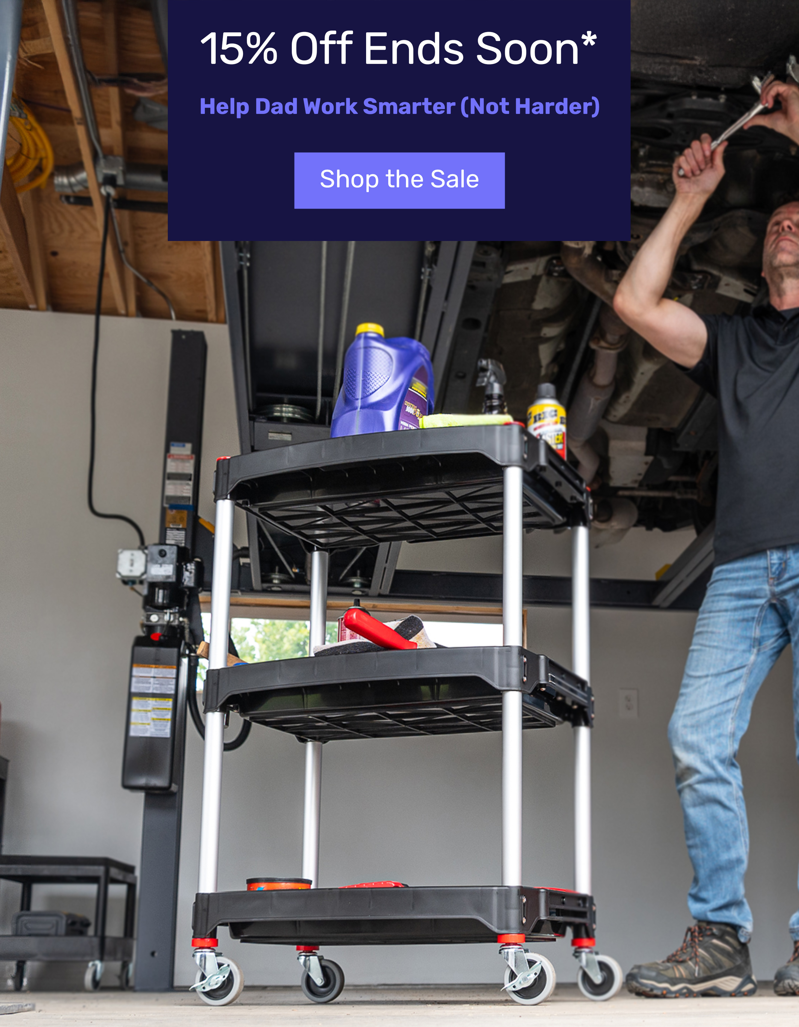 Man working at a standing desk in a bright office space. Promotional banner reads: 'Spring Clearance Event – Up to 50% Off*'.