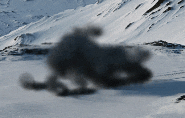 Blurred image of sled in the mountains