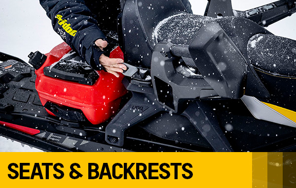 Hand adjusting seat on Ski-Doo sled