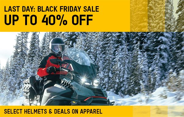 Riders wearing Ski-Doo attire outside