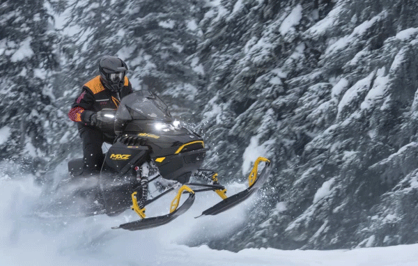 Ski-Doo rider jumping on sled