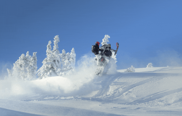Rider jumping on their Ski-Doo