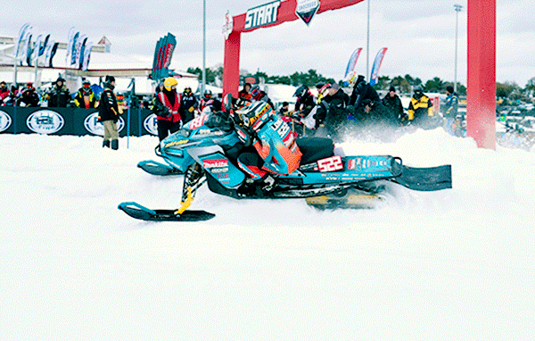 People racing with Ski-Doo sleds