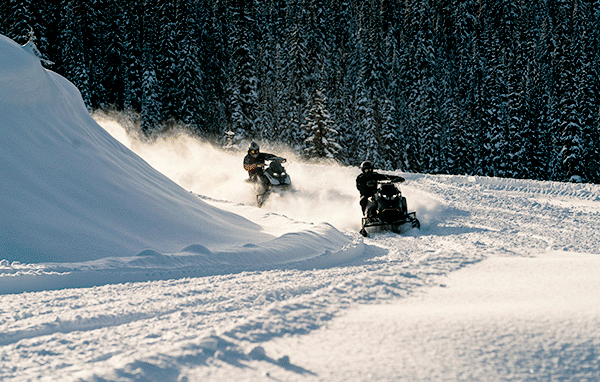 Group of people riding Ski-Doo models