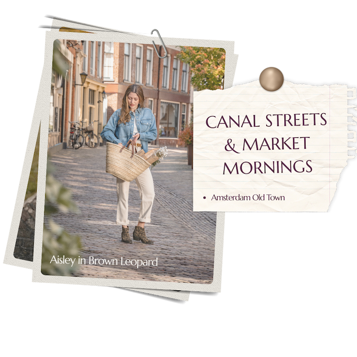 Woman in Aisley boots in Brown Leopard, carrying a basket on a cobblestone street in Amsterdam Old Town.