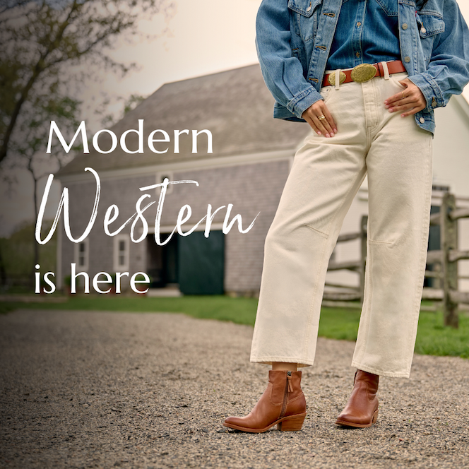 Model wearing Aisley in Brown stands in front of a rustic barn with the text “Modern Western is here” displayed on the image.