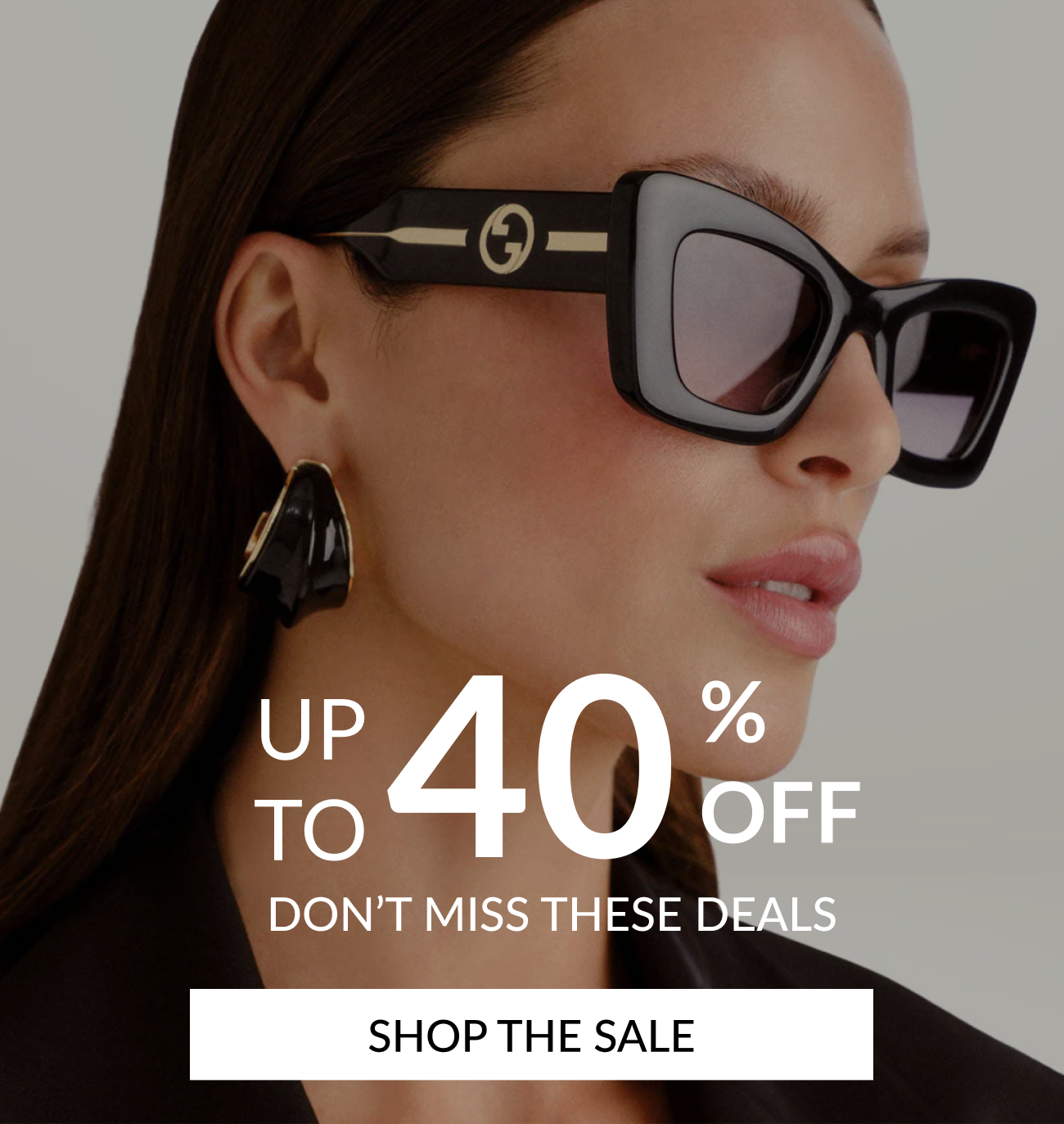 Woman wearing oversized black Gucci sunglasses with up to 40% off sale message