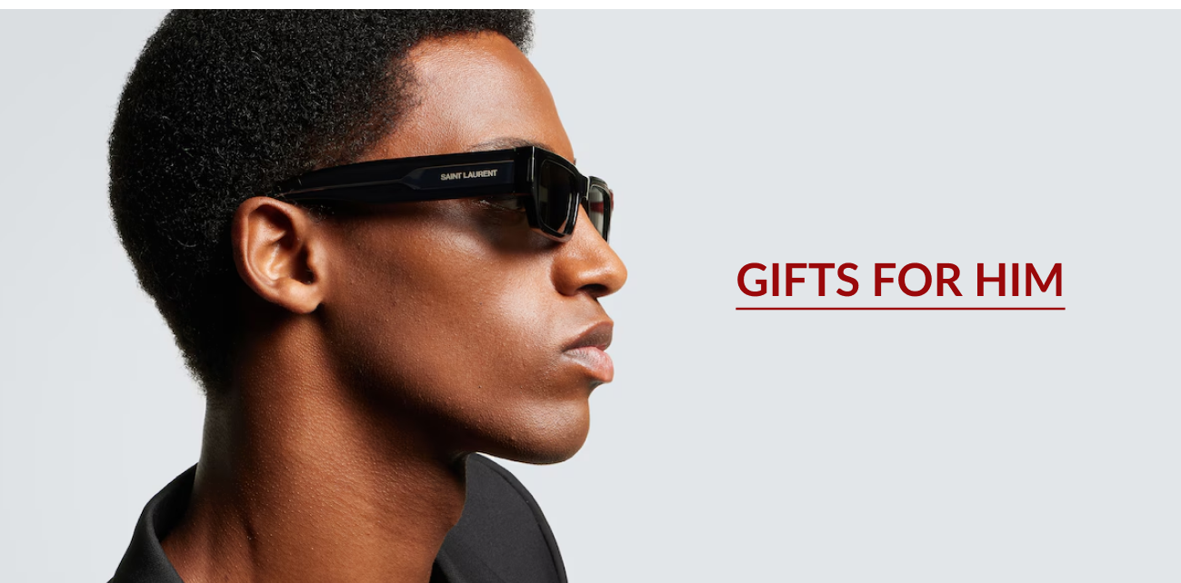Gifts for Him Banner Featuring a Man Wearing Black Saint Laurent Sunglasses in a Side Profile Pose