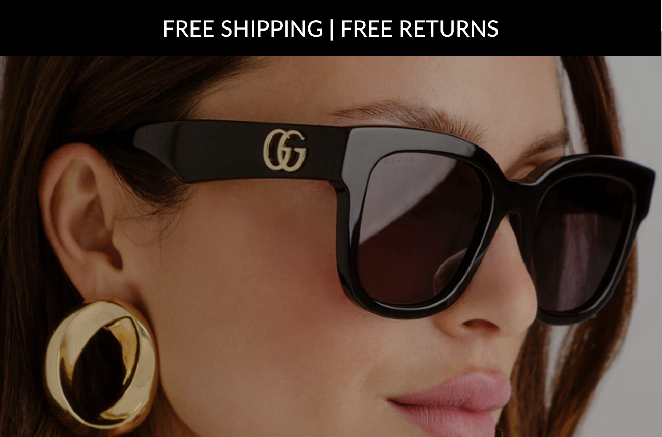 Free shipping and free returns promotional banner displayed above a model wearing black Gucci sunglasses.