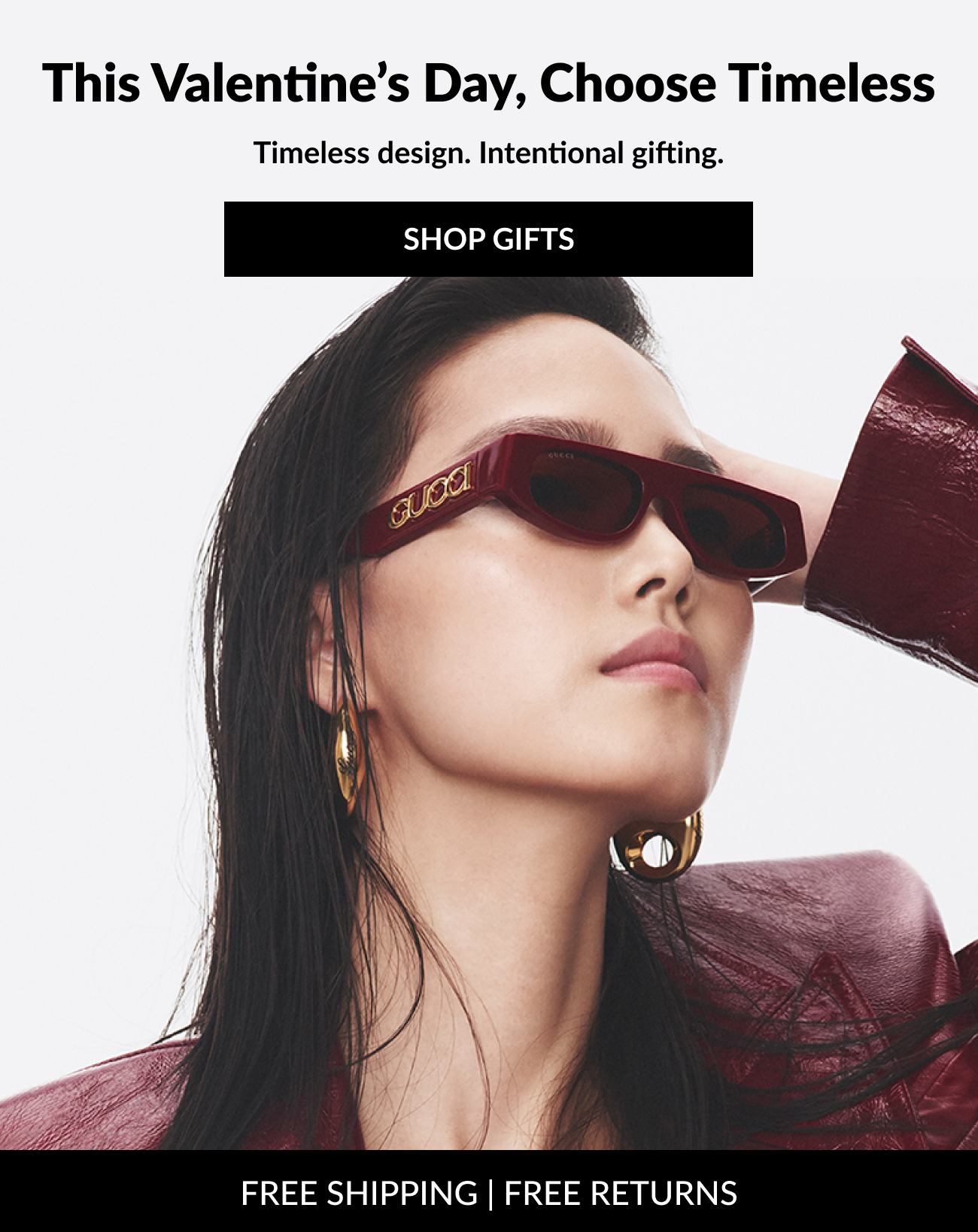 Model wearing red Gucci sunglasses styled with gold jewelry and a burgundy leather jacket, paired with “Shop Gifts” and Valentine’s Day messaging.