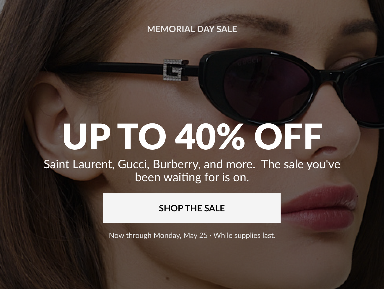 Hero image featuring a model wearing black designer sunglasses promoting the Memorial Day Sale with up to 40% off luxury eyewear.