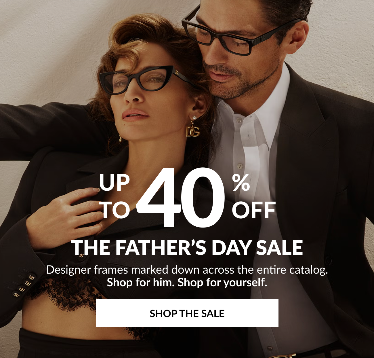 Lifestyle image of a man and woman wearing designer eyewear with heading that reads, "Up To 40% Off The Father's Day Sale," and Shop The Sale button.