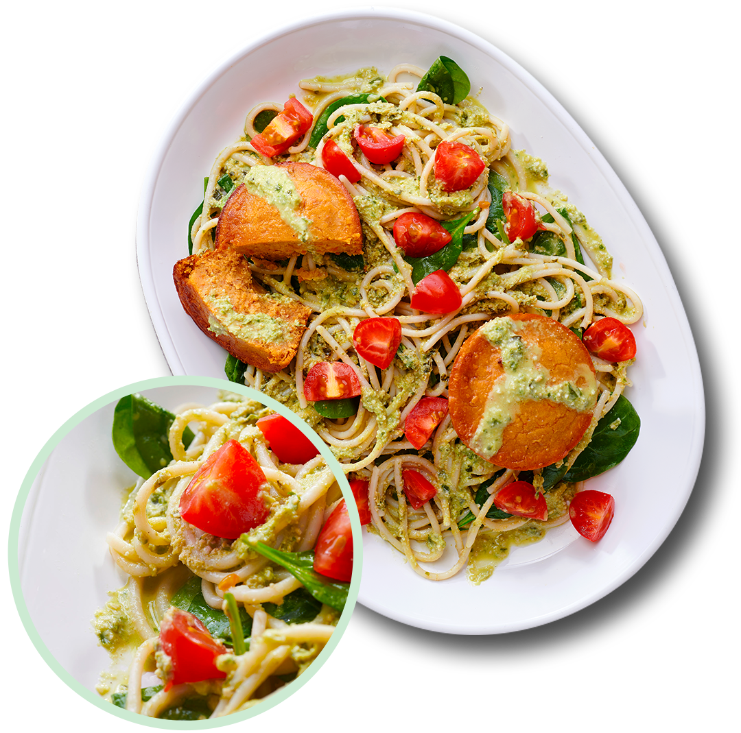 Zucchini Pesto Pasta with Tomato on Plate