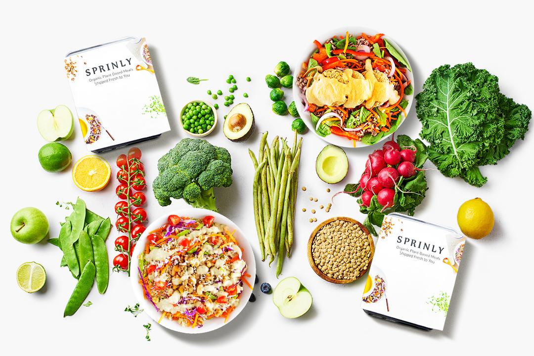 Flatlay of leafy vegetables and Sprinly meals