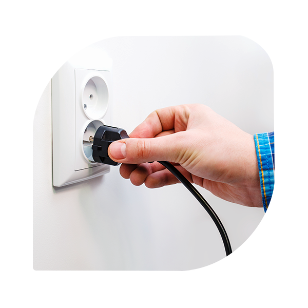 Male hand unplug the socket