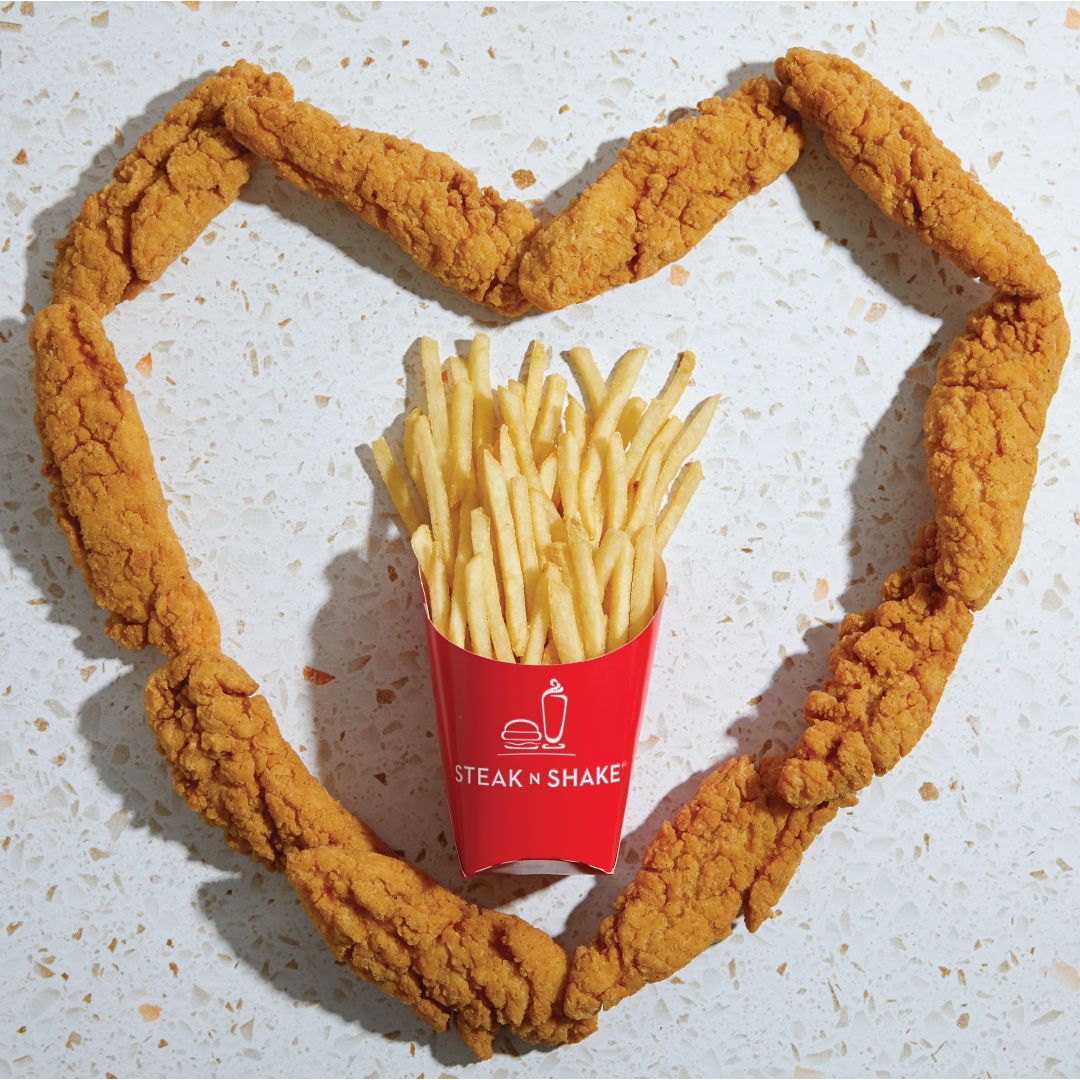 Chicken fingers heart around fries