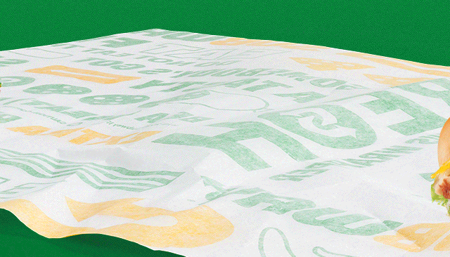 Promotional ad with a green background, showcasing a "Buy 1 Footlong, Get 1 for $1" offer in bold text with subs pictured beneath.
