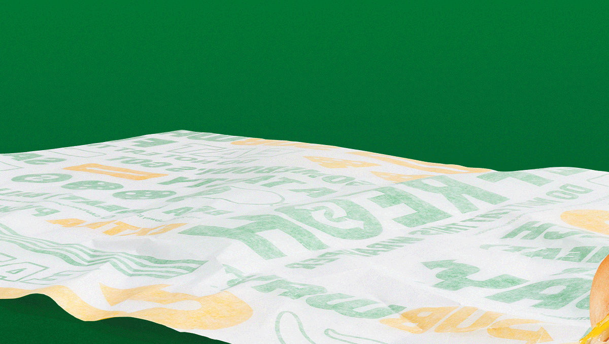 Promotional ad with a green background, showcasing a "Buy 1 Footlong, Get 1 for $1" offer in bold text with subs pictured beneath.