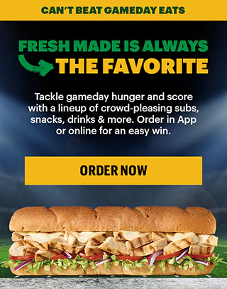 An image featuring a footlong sandwich. Text reads 'Can't beat gameday faves, fresh made is always the favorite'. Image conveys value and freshness.
