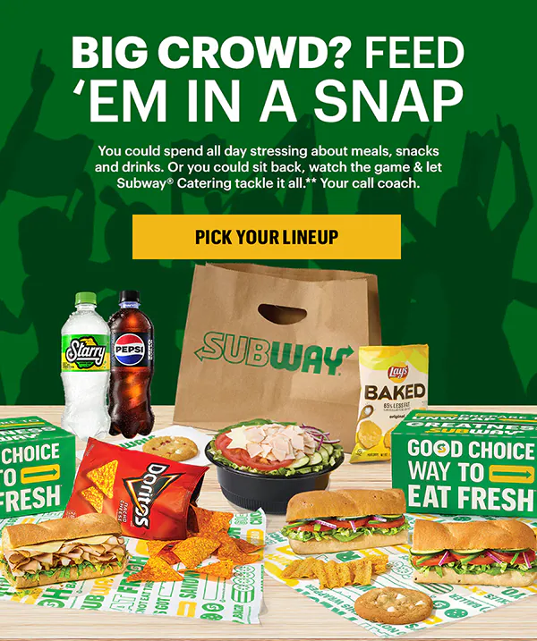 A variety of Subway® sandwiches, chips, and a salad are displayed on a table against a green backdrop. A Subway® bag and drinks are in the background. Bold text reads, "Big crowd? Feed 'em in a snap."