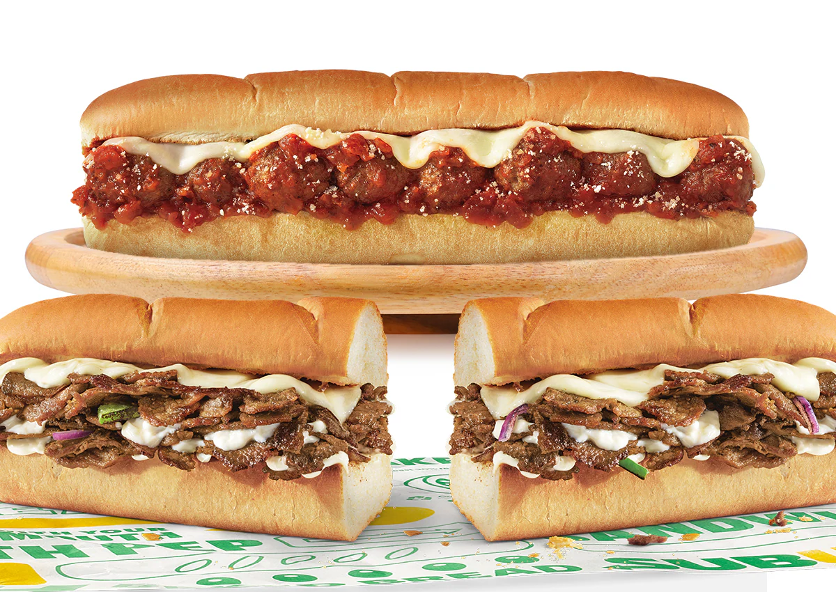 Promotional image for the new Subway rewards, Sub Club. The program offers stamps for purchases, one stamp equals one Footlong and a 6-inch equals half a stamp. The email promotes purchasing footlongs for the holiday season, to bring to your soirees and host in style. The image hosts a festive feel while highlighting different Subway subs and the Sub Club stamps.