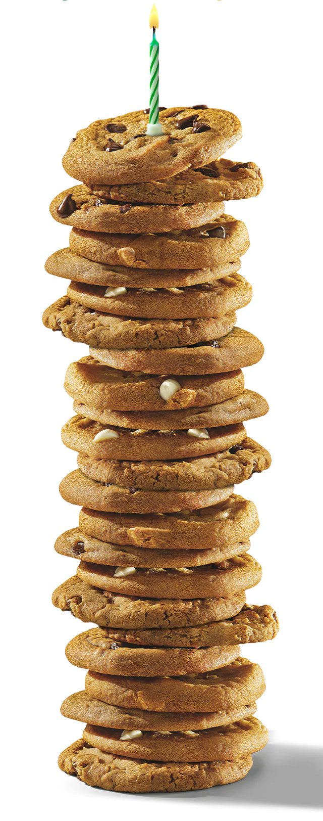 A tall stack of chocolate chip cookies with a lit candle on top celebrates a birthday. Musical notes surround green birthday text, adding a festive touch.