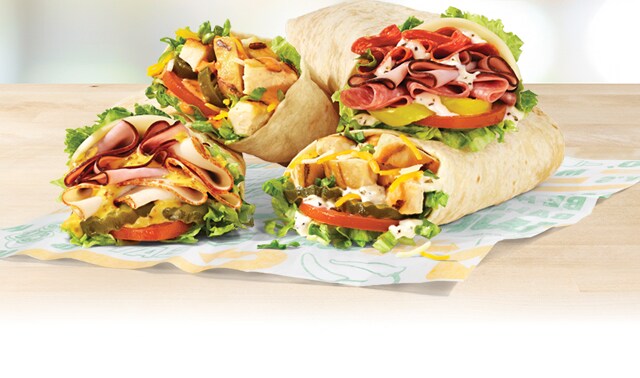 Promotional email announcing Subway’s new Protein Pockets. Header reads: ‘Sub Club Preview: Introducing Protein Pockets’. Hero image shows freshly prepared Protein Pockets on a countertop with vibrant ingredients and a variety of sauces. Two prominent badges highlight ‘High Protein’ and ‘Great Price.’ Call-to-action button says ‘Order Now.’ Layout is clean and food-forward, emphasizing affordability and freshness.