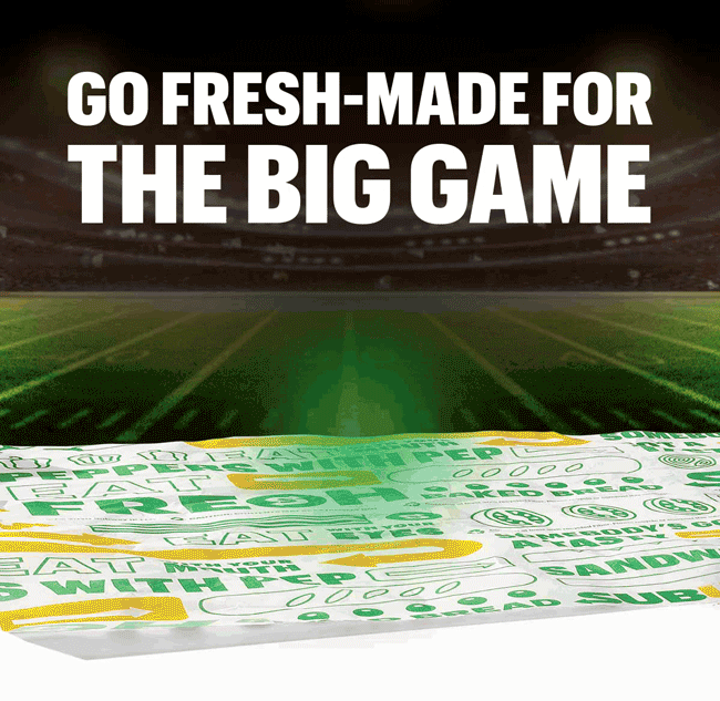 Promotional graphic featuring two Subway subs positioned as competing “teams” for the big game, followed by a catered spread that includes sandwiches, chips, drinks, and cookies. Headline encourages choosing a favorite sub and highlights Subway Catering as an easy way to feed a group. A button at the bottom reads “Order a Win.”. It also promotes purchasing gift cards for Valentine's day, with the offer "get a free footlong cookie with every $25 in gift cards purchased.".