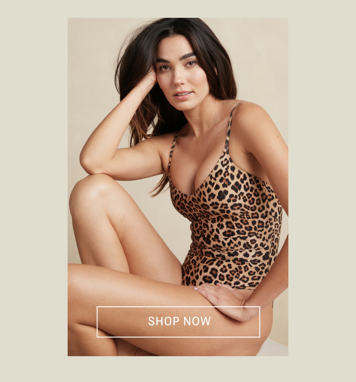 Model in leopard print one piece swimsuit
