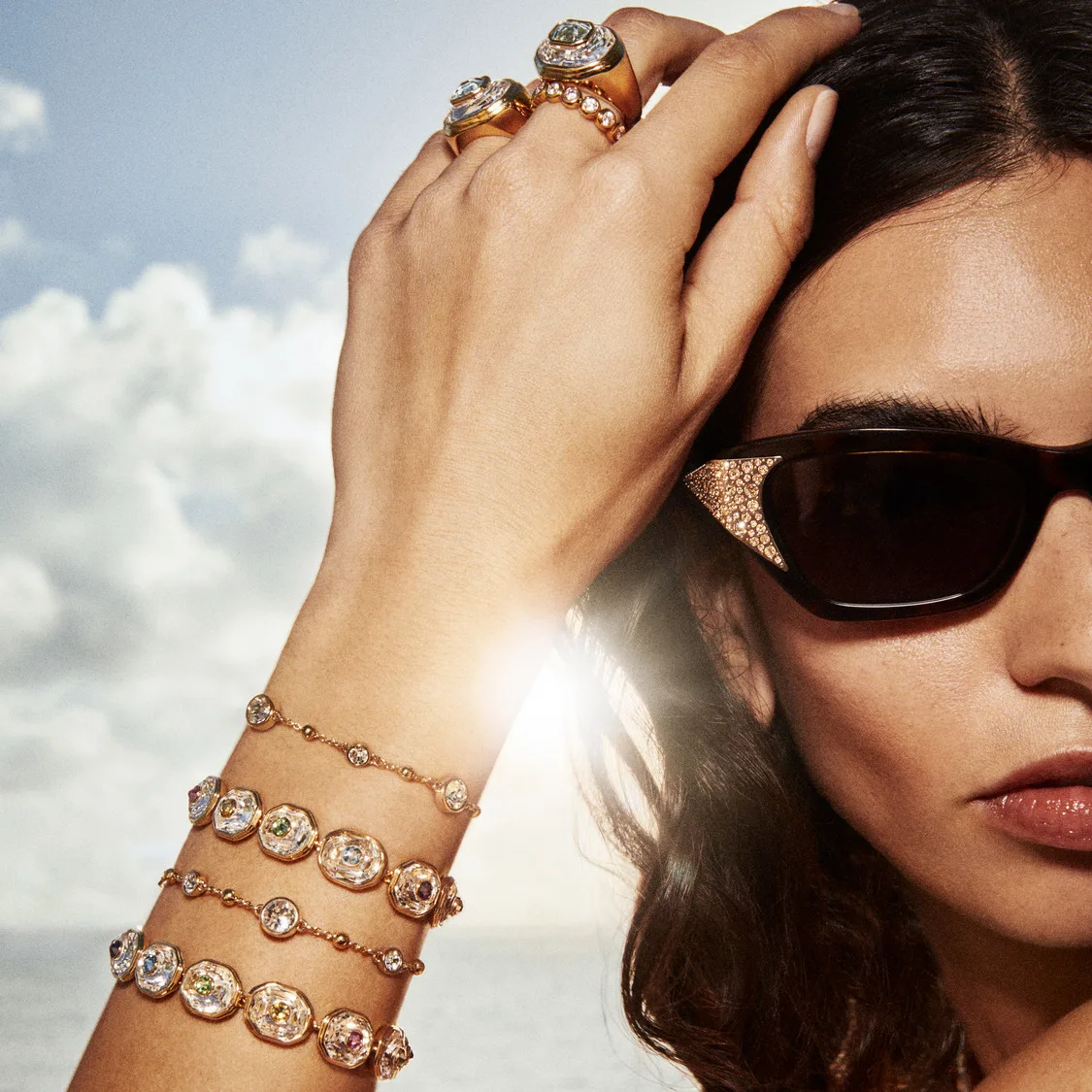 Model wearing Swarovski Imber and Chroma bracelets