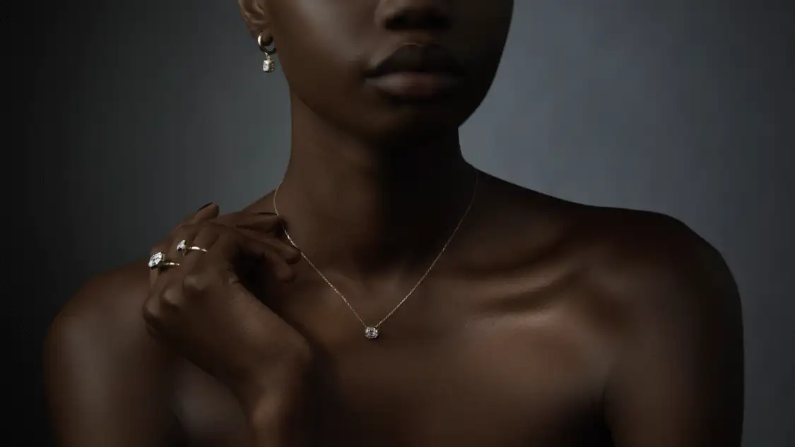 Model wearing Swarovski Octagon earrings, pendant and rings