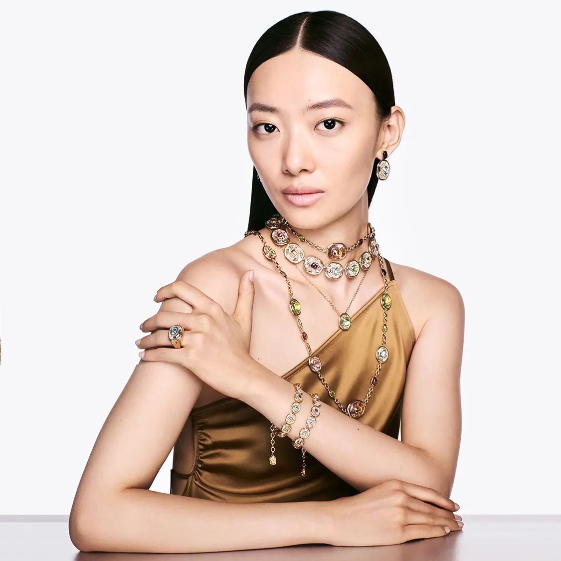 Model wearing Swarovski jewelry in different styles