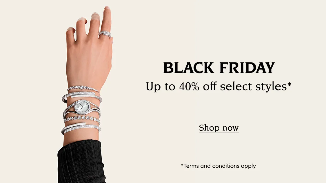 Swarovski Black Friday - model's hand showing select jewelry pieces