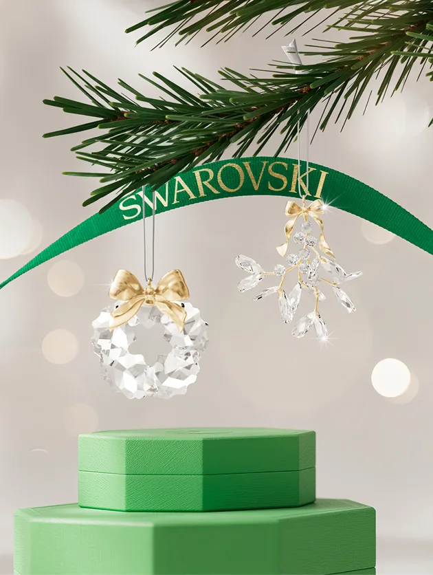 Swarovski crystal mistletoe and wreath shaped ornaments with gifting ribbons and boxes