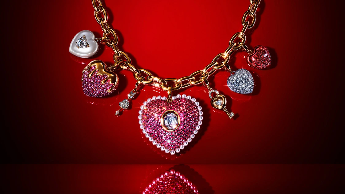 Swarovski necklace with several Swarovski Charms attached