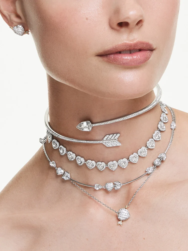 Model wearing necklaces