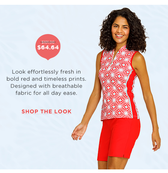 Woman in red and blue printed top and red shorts