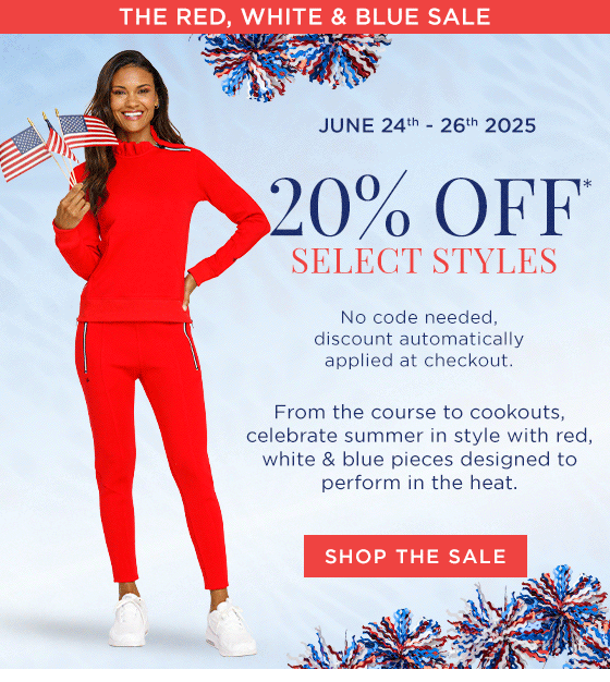 Model in red pullover with ruffle collar and red joggers with zipper pockets