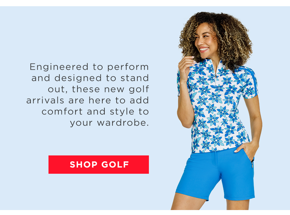 Model in white and blue floral short sleeve top and matching blue shorts