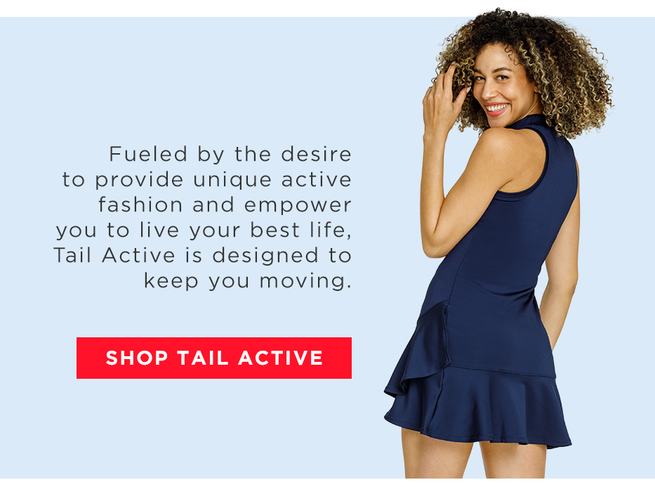 Model in navy blue tank dress wiith pleated hem detail