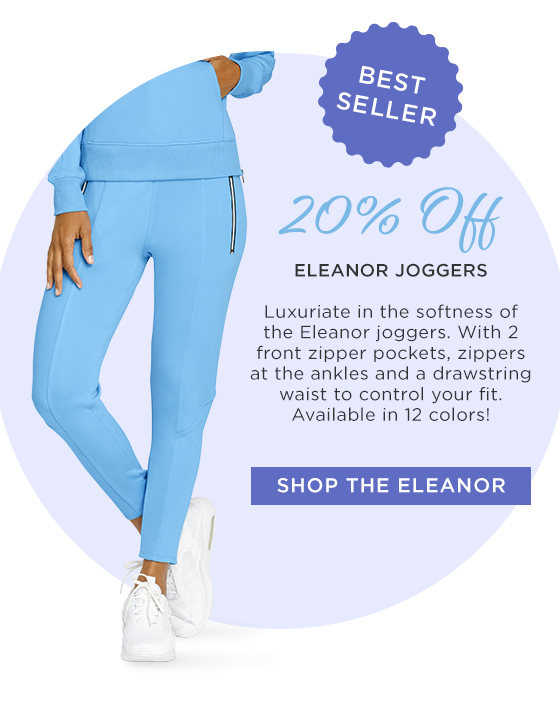 Woman in light blue jogger pants with zipper pockets